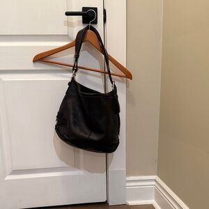 Elegant Black Leather Shoulder Bag by Coach